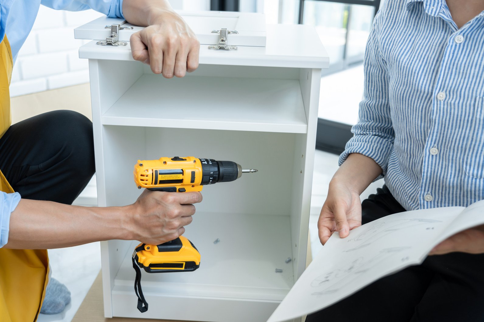 People Assembling Furniture